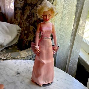 Vintage Marilyn Monroe Doll. Pink dress from Gentleman prefer blondes.